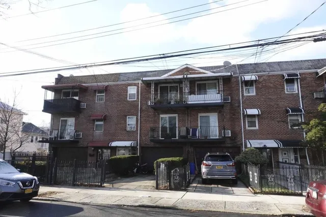 a front view of a building with street