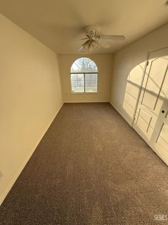 en empty room with windows