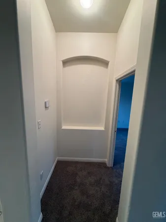 a view of storage and utility room with a sink