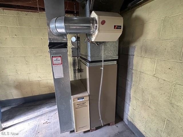 3216 South Ridge Road West Ashtabula, OH 44004 - Photo 14 of 17 Utility room featuring heating unit