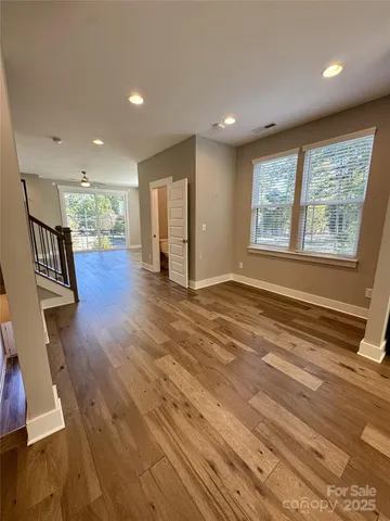 a view of livingroom with hardwood and furniture