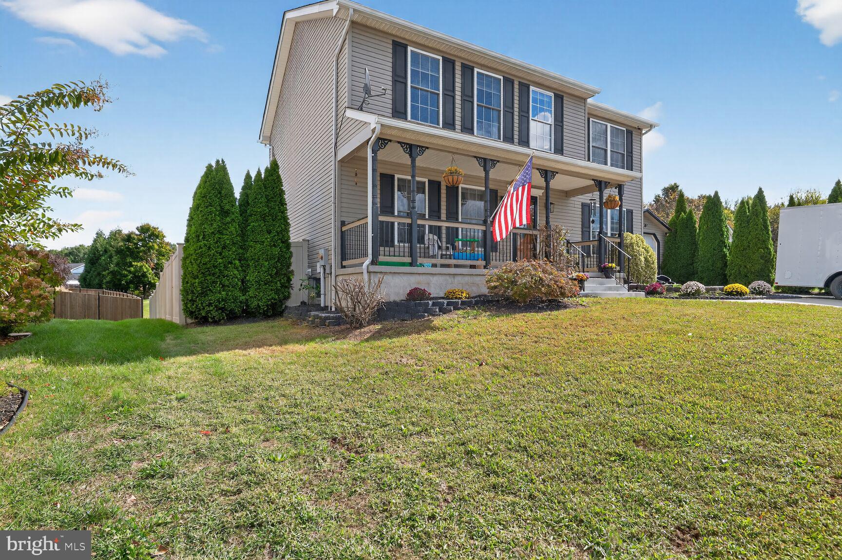 71 Fairground Avenue Taneytown, MD 21787 - Photo 22 of 36 a view of brick house with a yard