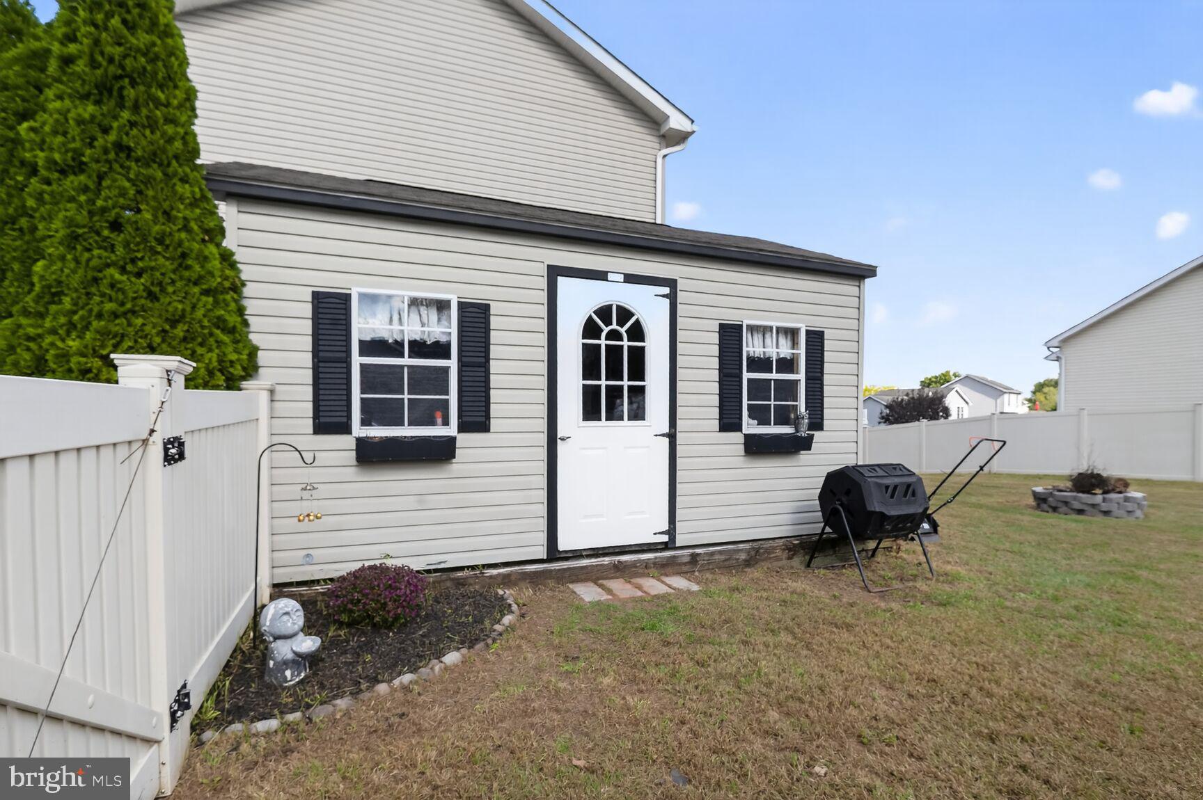 71 Fairground Avenue Taneytown, MD 21787 - Photo 23 of 36 a view of a house with backyard and sitting area