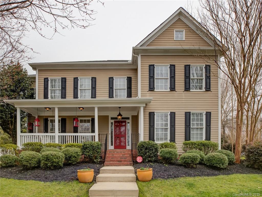 1502 Hubbard Court Fort Mill, SC 29708 - Photo 1 of 36 a front view of a house with a yard and potted plants