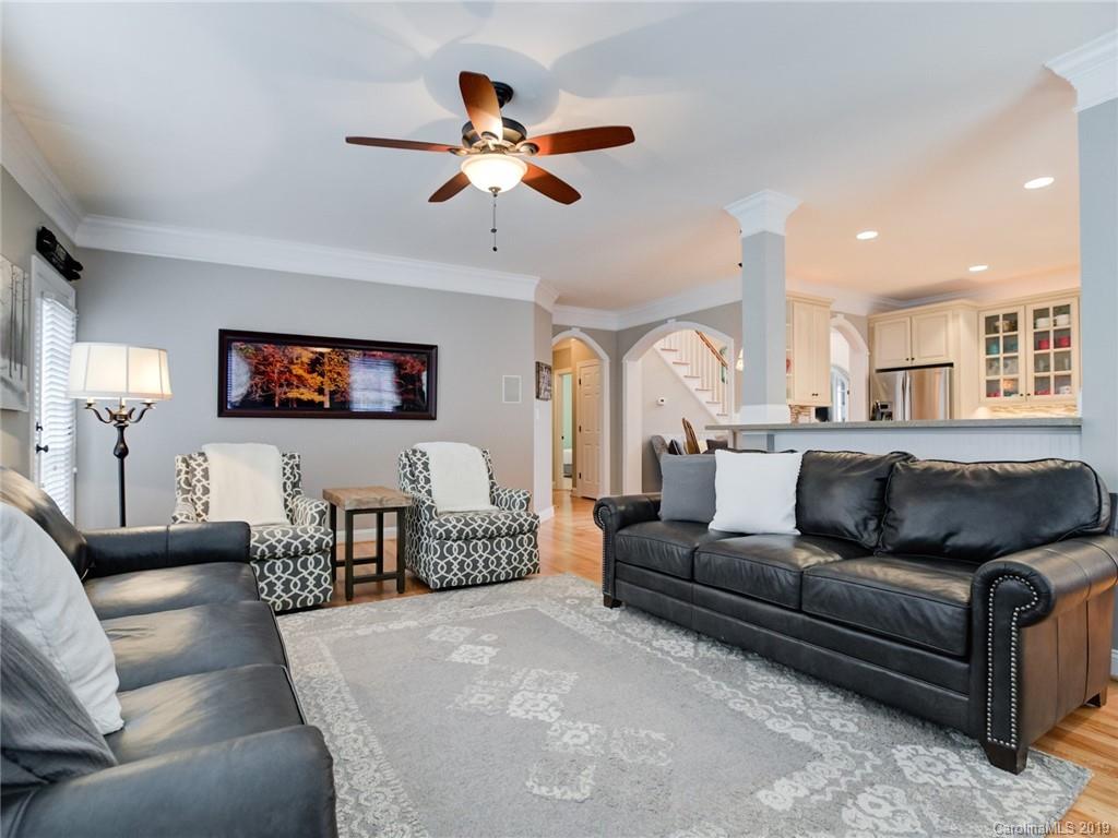 1502 Hubbard Court Fort Mill, SC 29708 - Photo 15 of 36 a living room with furniture and a flat screen tv