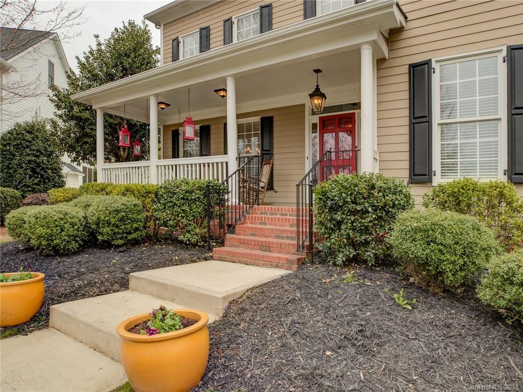 1502 Hubbard Court Fort Mill, SC 29708 - Photo 3 of 36 a front view of a house with garden