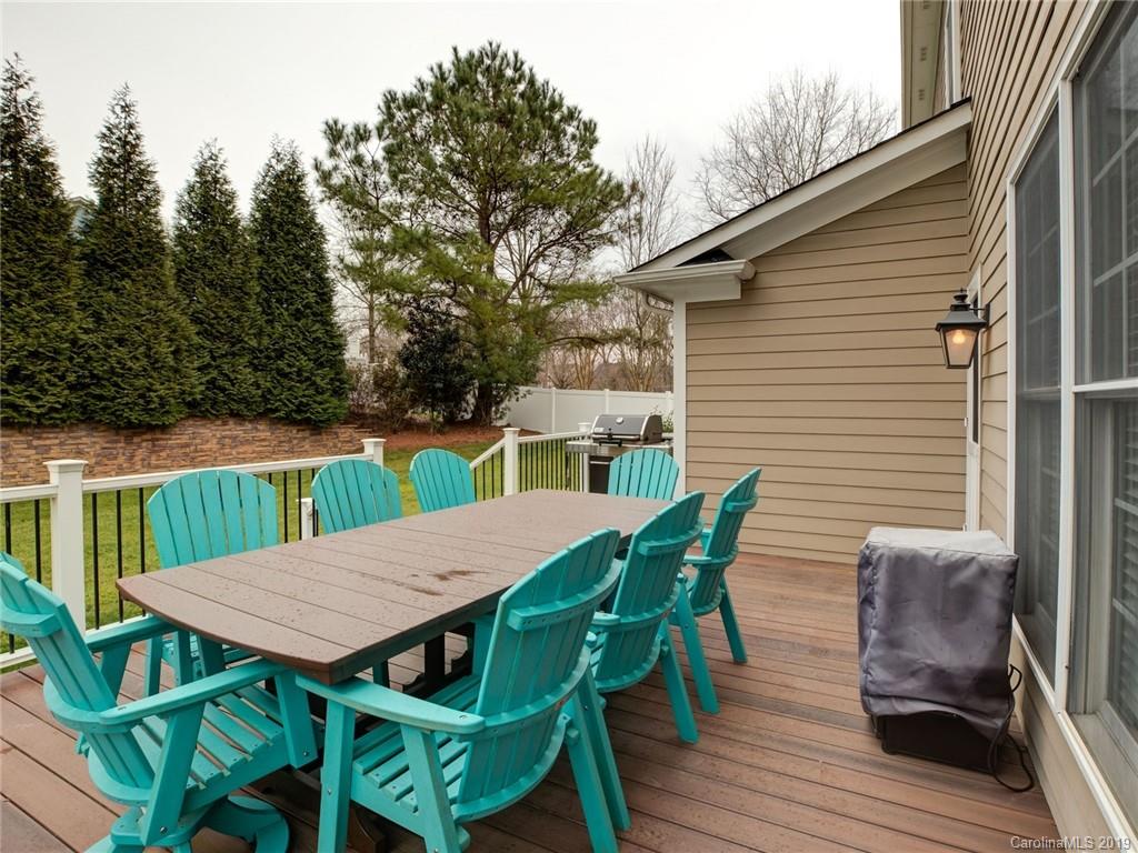 1502 Hubbard Court Fort Mill, SC 29708 - Photo 34 of 36 a view of a roof deck with table and chairs