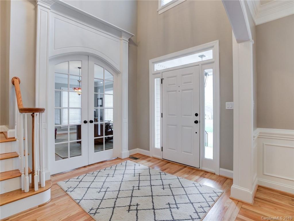 1502 Hubbard Court Fort Mill, SC 29708 - Photo 5 of 36 wooden floor and an entryway with a rug