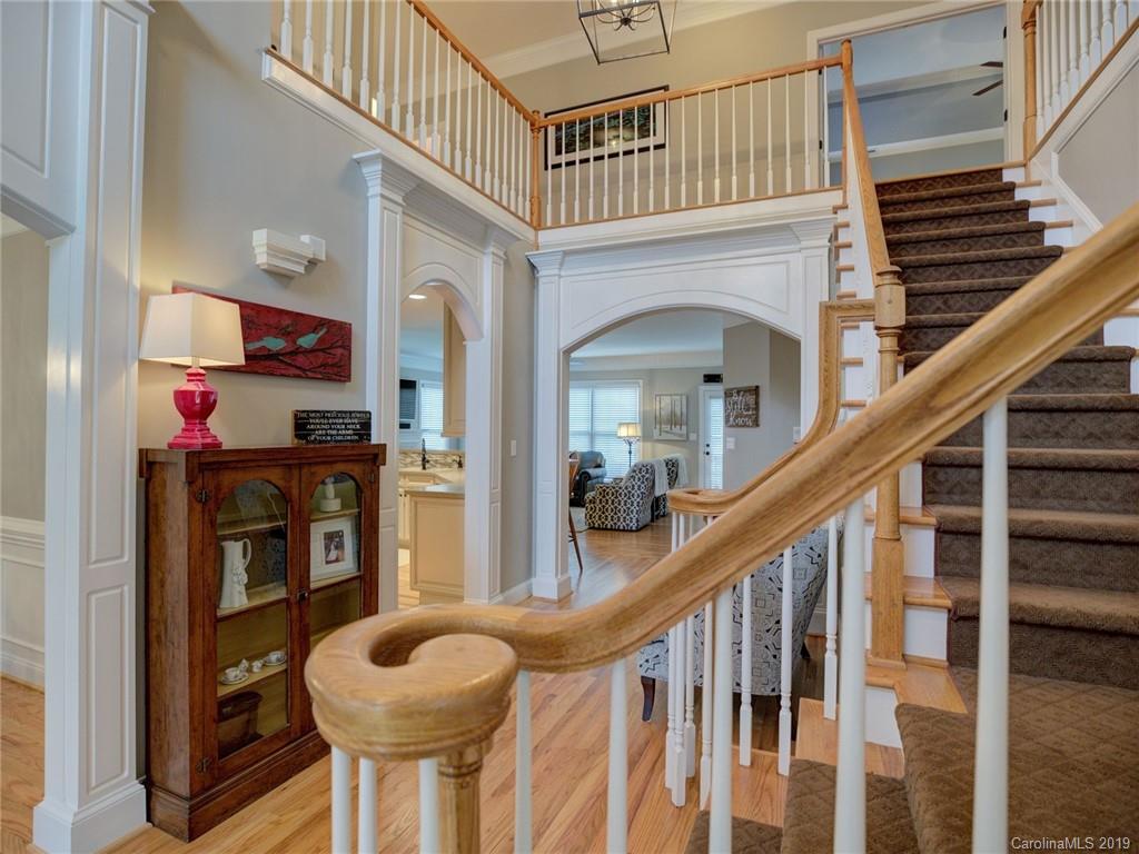 1502 Hubbard Court Fort Mill, SC 29708 - Photo 9 of 36 a view of entryway and hall with wooden floor