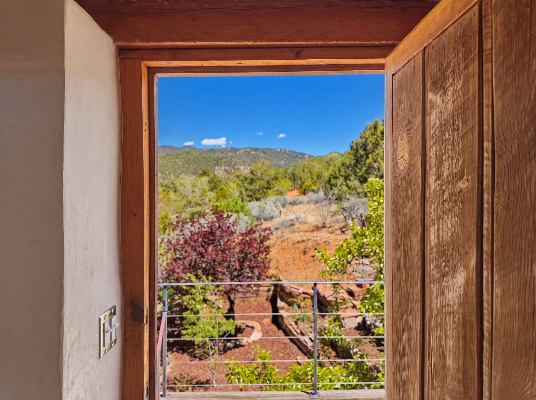 1692 Upper Canyon Road Santa Fe, NM 87501 - Photo 36 of 52 Eastern view through Private Retreat doorway.
