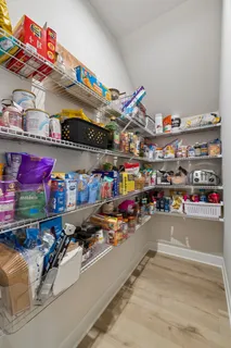 a utility room with washing machine and a washing machine