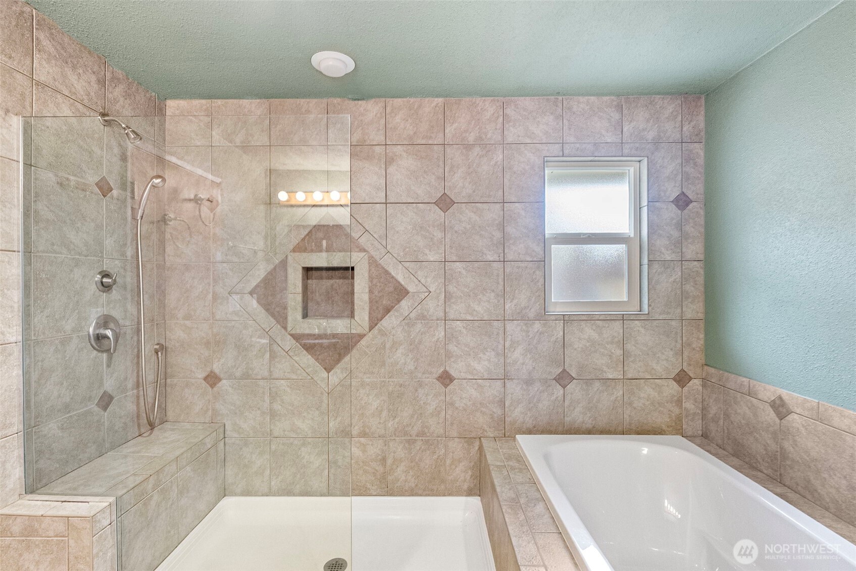 2821 Sanders Avenue Bremerton, WA 98310 - Photo 17 of 40 a bathroom with a bathtub and shower