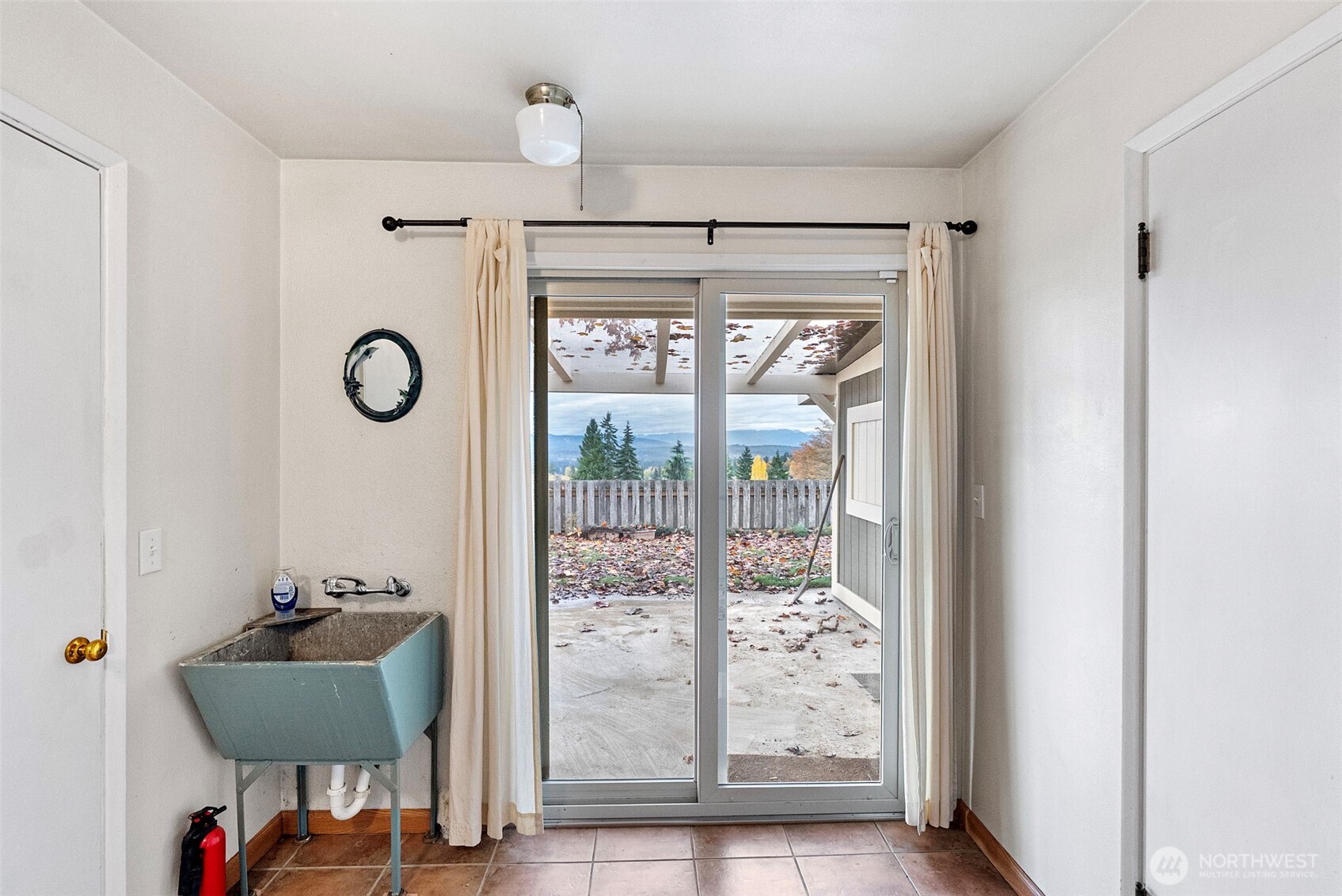 2821 Sanders Avenue Bremerton, WA 98310 - Photo 25 of 40 a room with furniture and a window