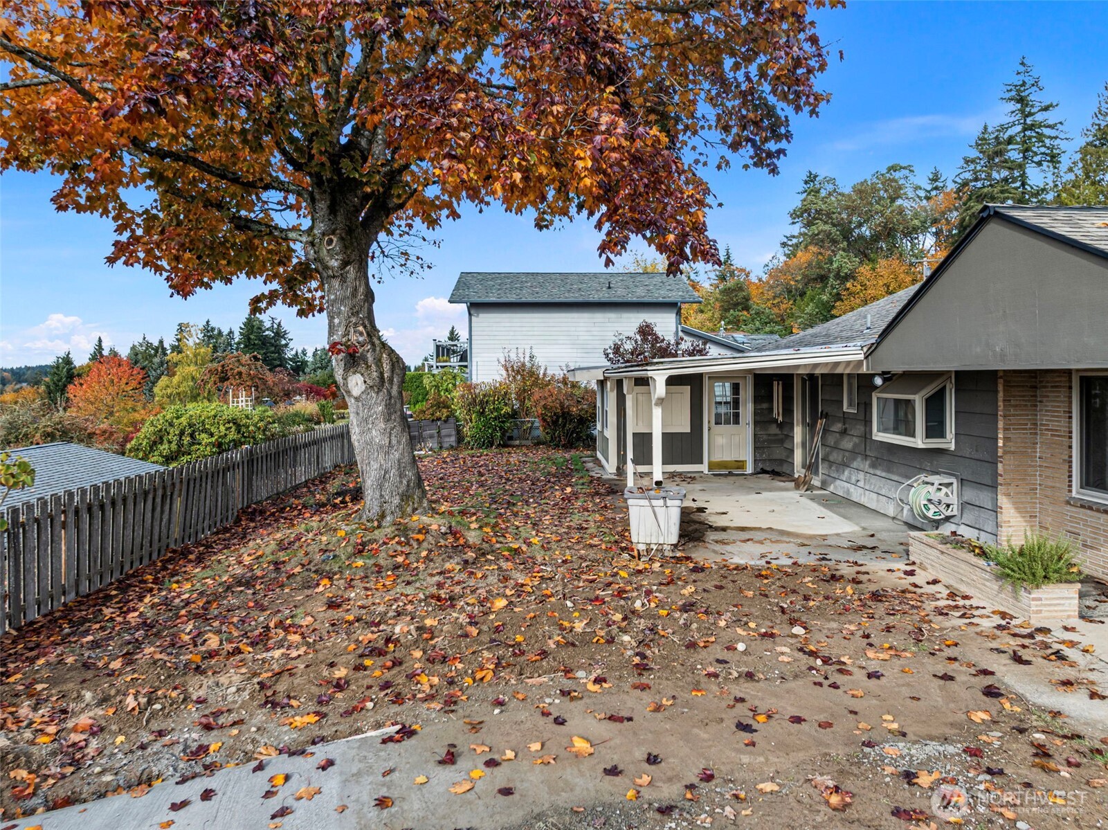 2821 Sanders Avenue Bremerton, WA 98310 - Photo 32 of 40 a front view of a house with a garden