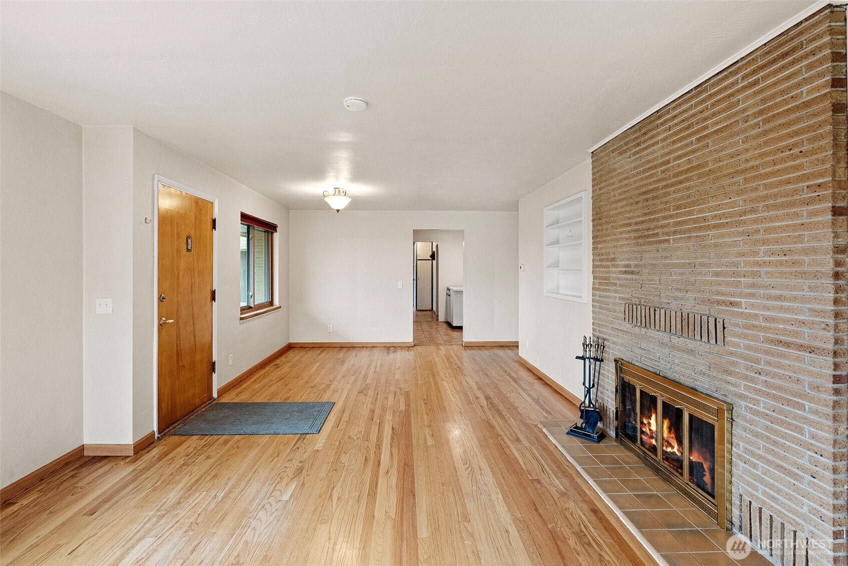 2821 Sanders Avenue Bremerton, WA 98310 - Photo 8 of 40 a view of a hallway with wooden floor and staircase