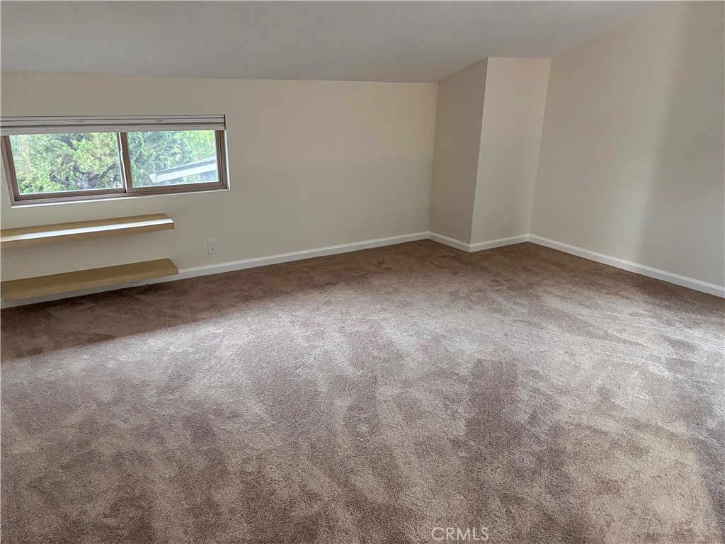 1445 Prefumo Canyon Road, Unit 20 San Luis Obispo, CA 93405 - Photo 14 of 19 a view of room with window