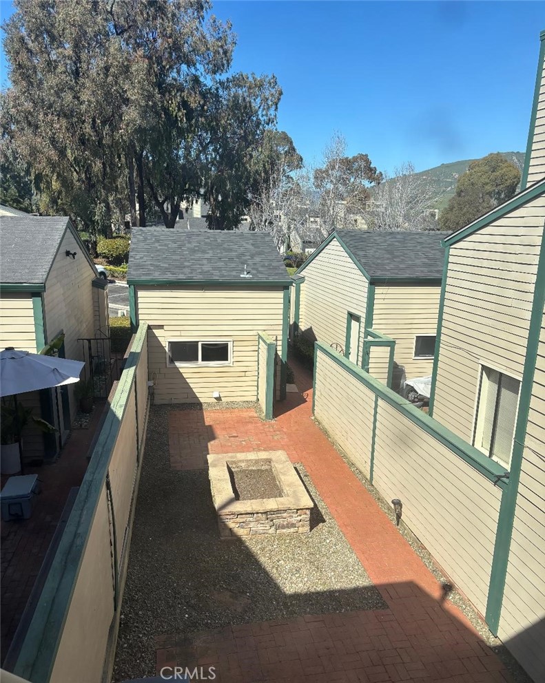 1445 Prefumo Canyon Road, Unit 20 San Luis Obispo, CA 93405 - Photo 17 of 19 a view of a balcony with furniture