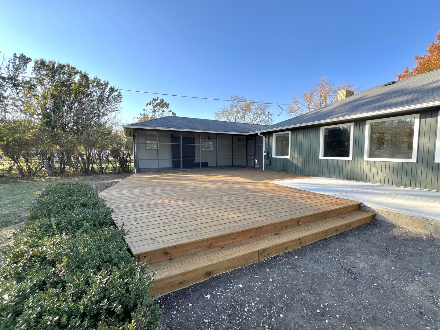 1630 Jonathan Avenue Rockford, IL 61103 - Photo 14 of 23 a view of a house with a yard and potted plants
