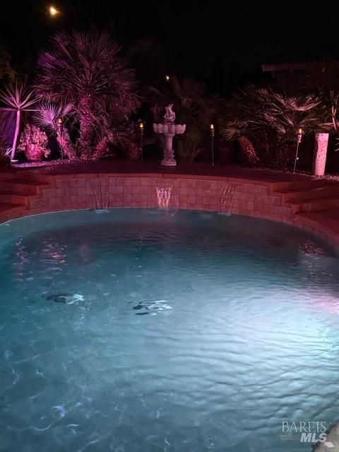 331 Frisbie Circle Vacaville, CA 95688 - Photo 77 of 99 Upgraded Pentair "IntelliBrite" color light system installed which offers an unlimited selection of colors for your pool and landscaping!