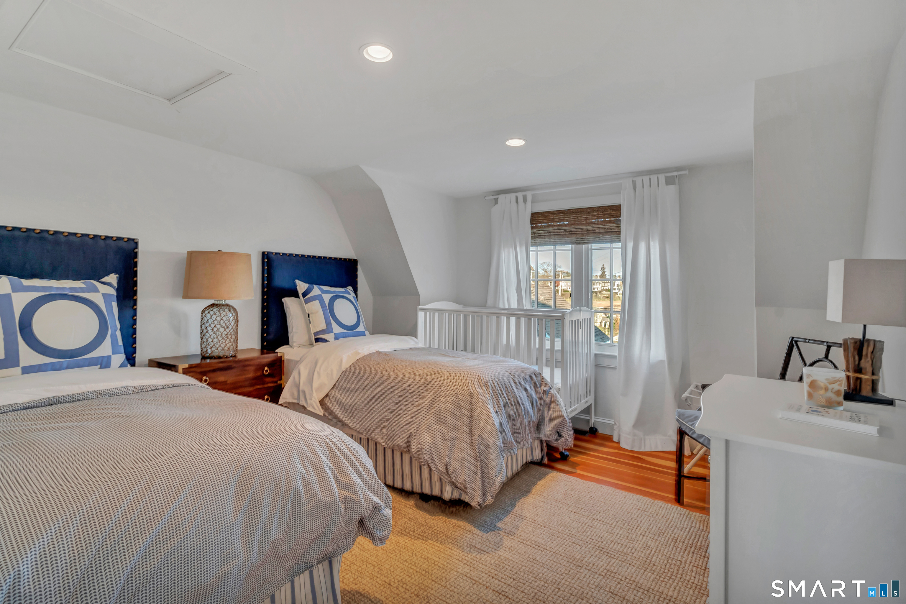 165 Middle Beach Road Madison, CT 06443 - Photo 11 of 14 The 2nd bedroom offering 2 twin beds.