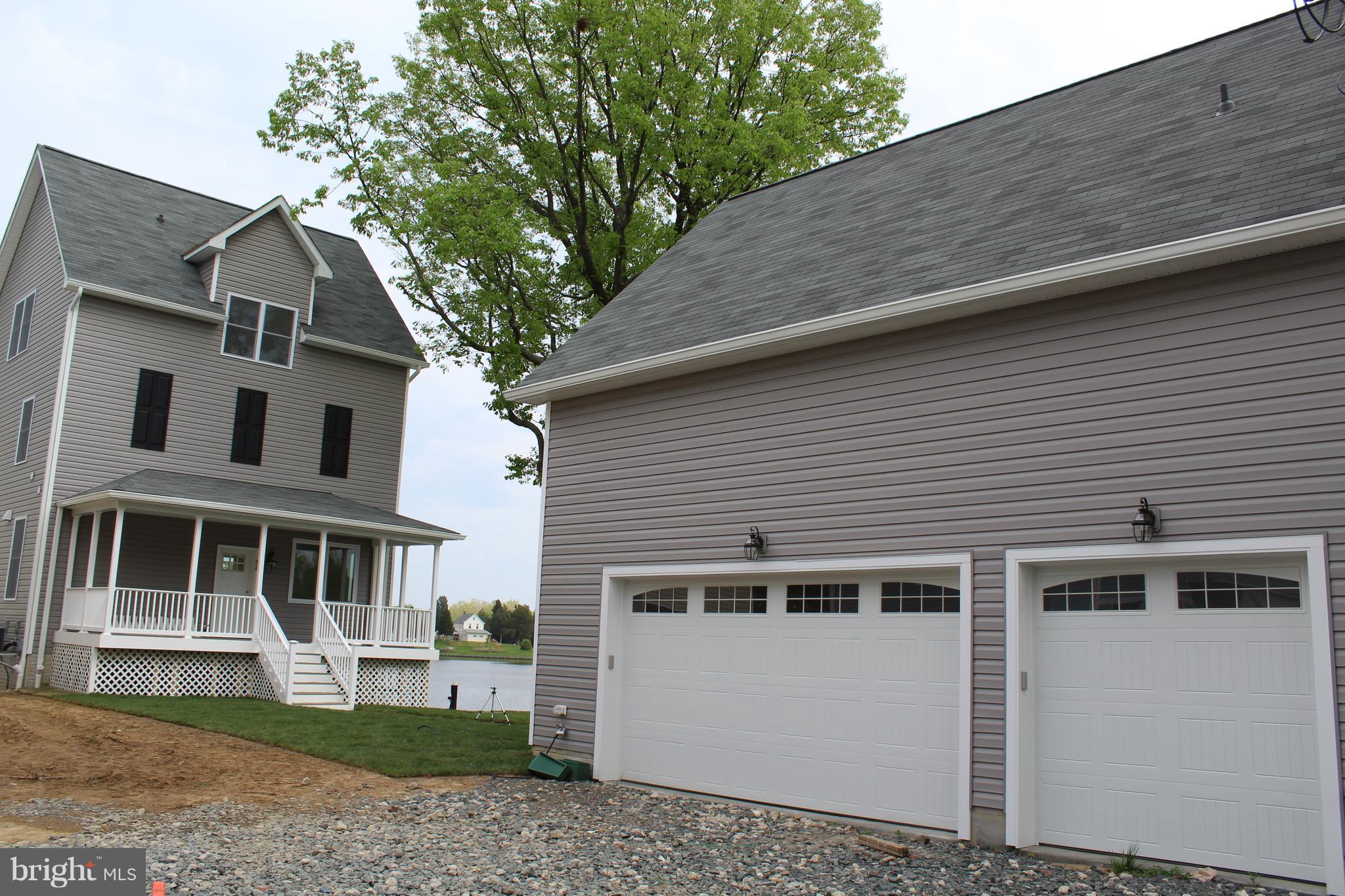 52 Johnson Road Pasadena, MD 21122 - Photo 4 of 30 3 car garage w/studio above w/ water view
