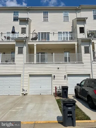a front view of a house with a garage