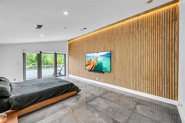 a view of backyard with floor to ceiling window and floor to ceiling window