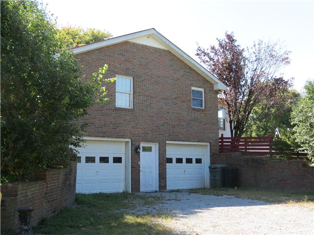 3270 Franklin Road Lebanon, TN 37090 - Photo 3 of 20 2 CAR GARAGE WITH TONS OF STORAGE AND ROOM TO PARK