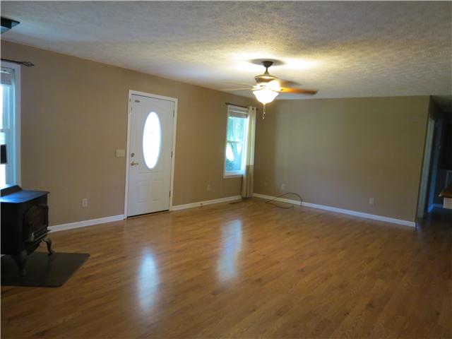 3270 Franklin Road Lebanon, TN 37090 - Photo 5 of 20 NICE LIVING ROOM WITH LAMINATE WOOD FLOORING AND NEW PAINT