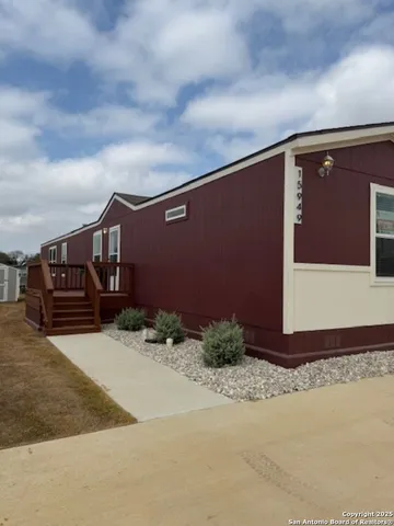 a house with trees in front of it