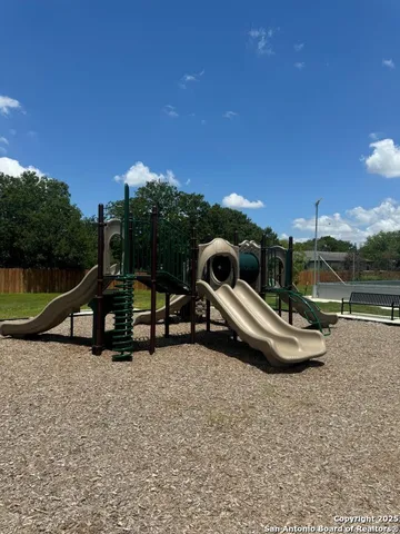 a view of a park with slide