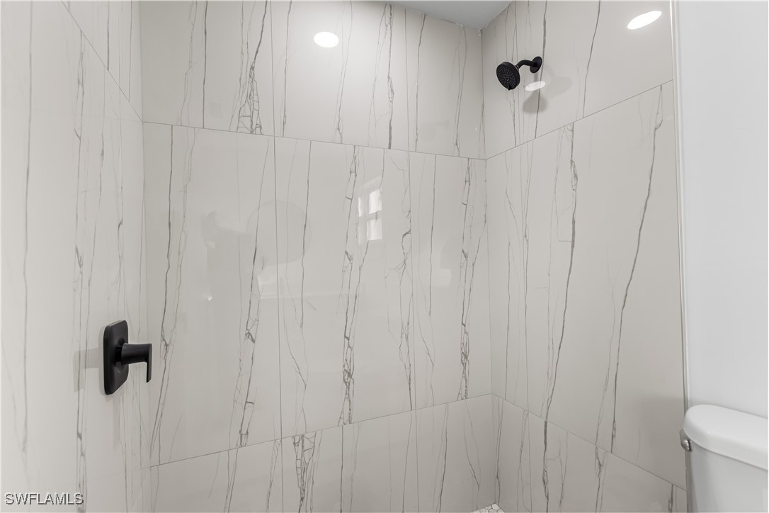 100 Wyoming Road Lehigh Acres, FL 33936 - Photo 26 of 38 a close view of shower tap