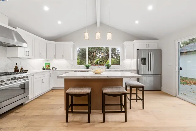a bathroom with a window and a shower