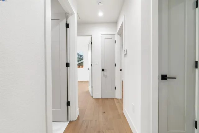 a kitchen with cabinets and window