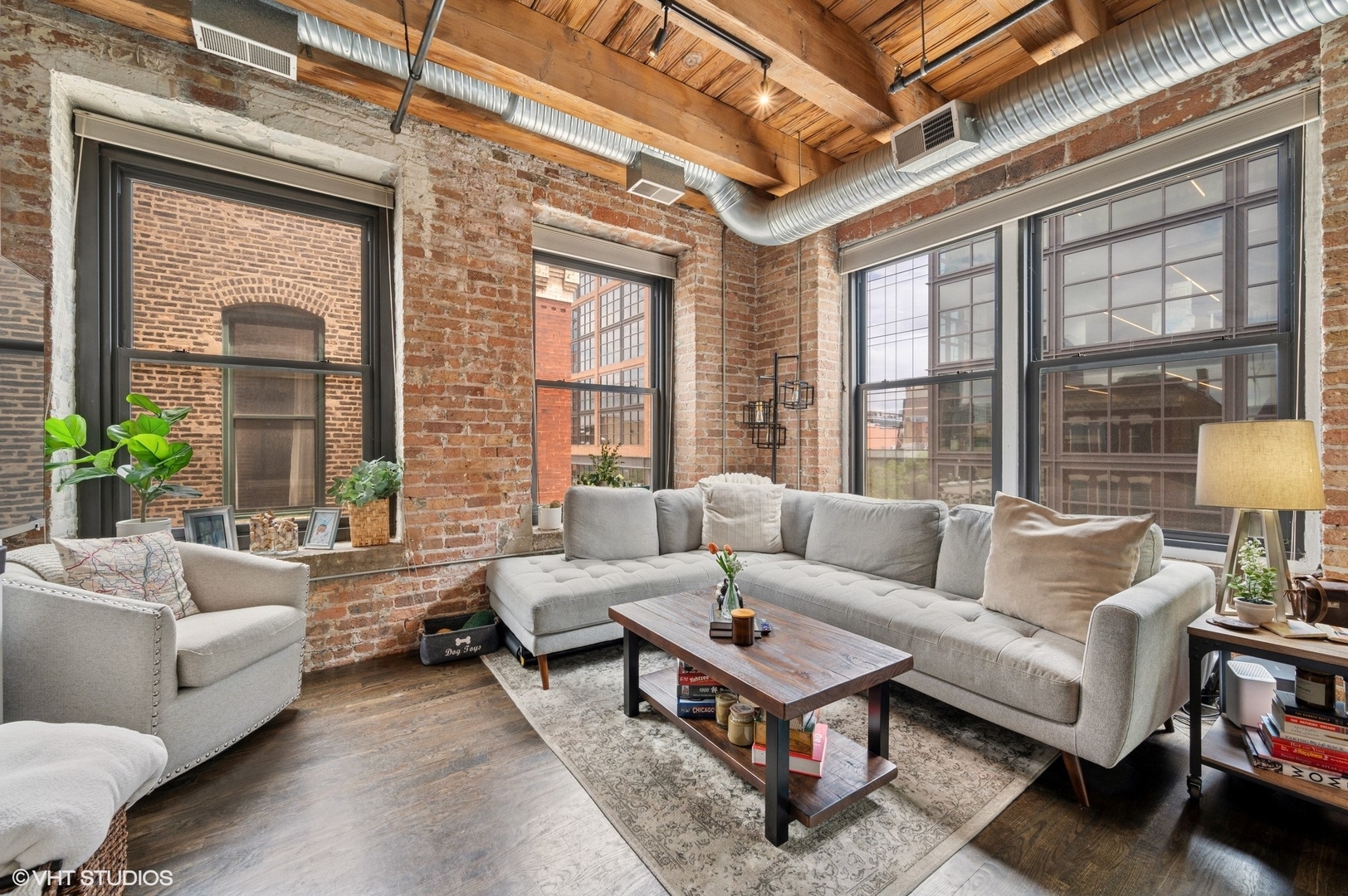 106 North Aberdeen Street, Unit 3A Chicago, IL 60607 - Photo 2 of 13 a living room with furniture and a large window