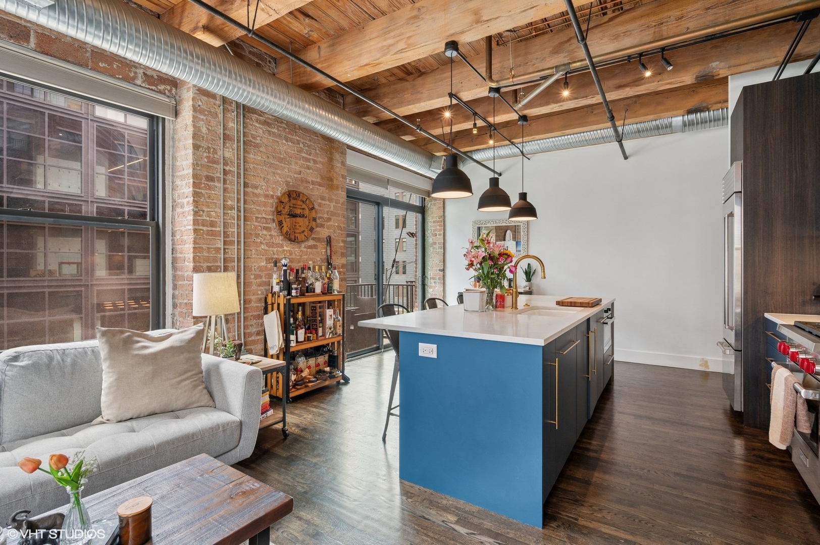 106 North Aberdeen Street, Unit 3A Chicago, IL 60607 - Photo 6 of 13 a view of living room with furniture and a chandelier