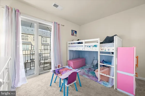 a workspace with furniture and a window