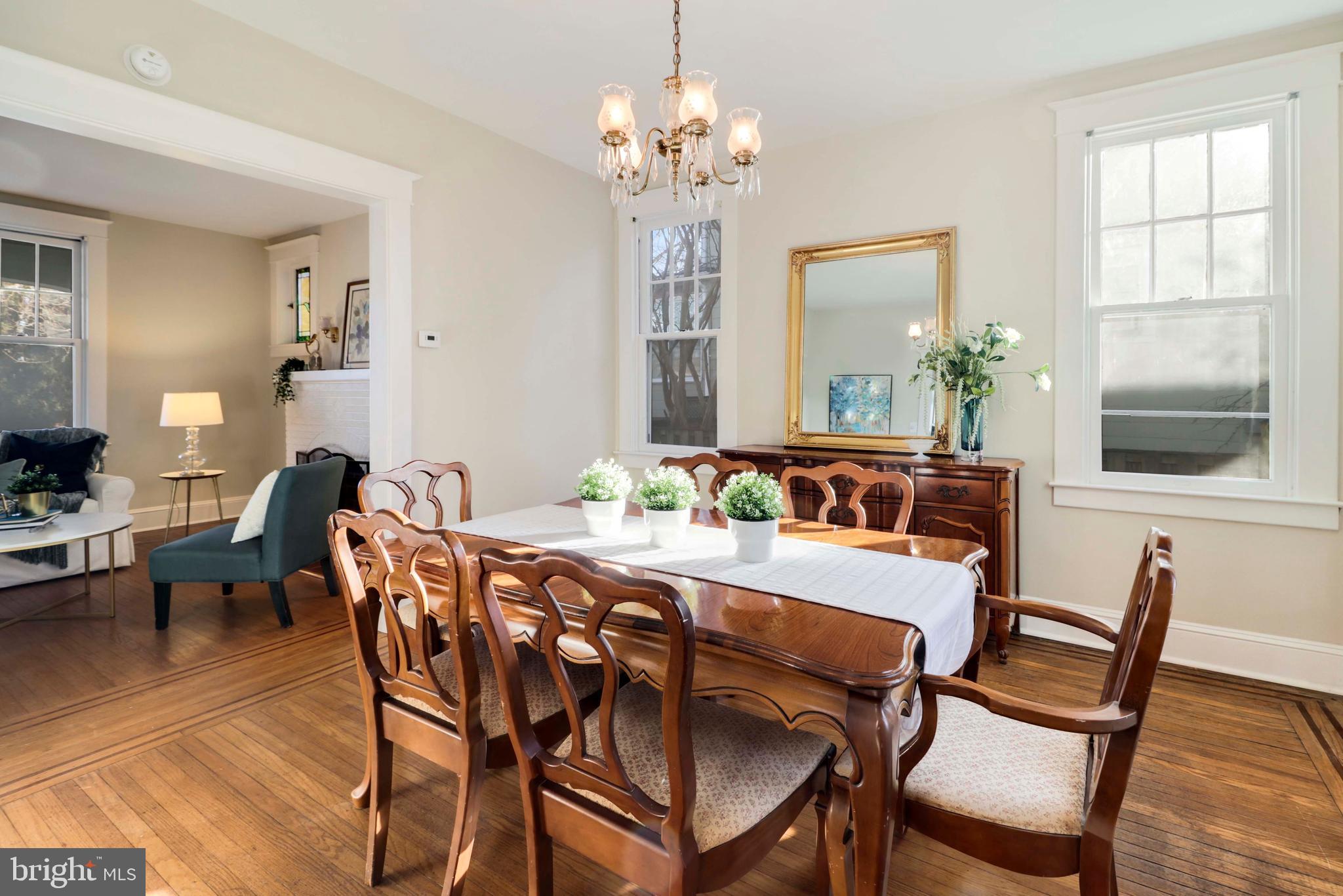 5314 Brabant Road Baltimore, MD 21229 - Photo 8 of 22 a view of a dining room with furniture window and wooden floor