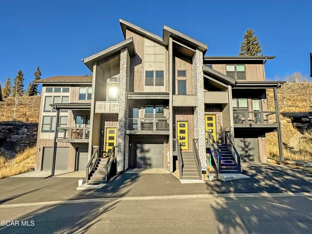 a front view of a building with glass windows