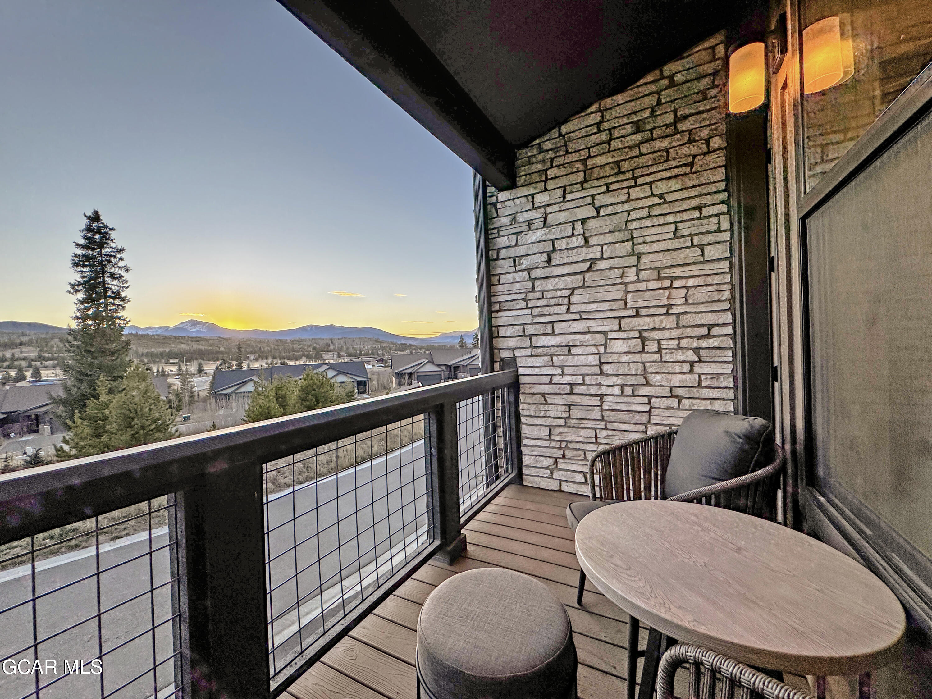 166 Homestead Loop Fraser, CO 80442 - Photo 12 of 56 a view of a balcony with chairs