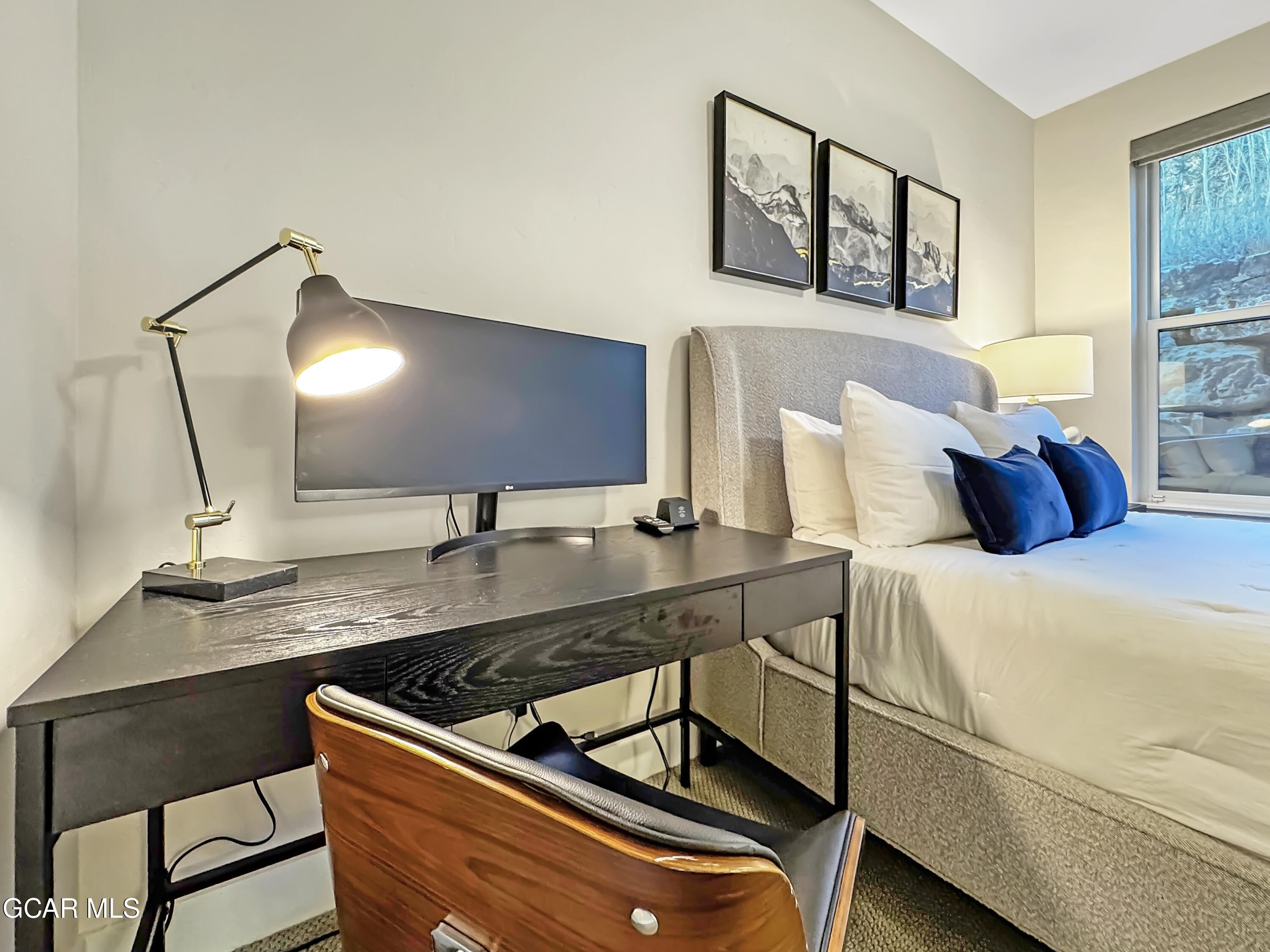 166 Homestead Loop Fraser, CO 80442 - Photo 28 of 56 a room with a bed and a sink