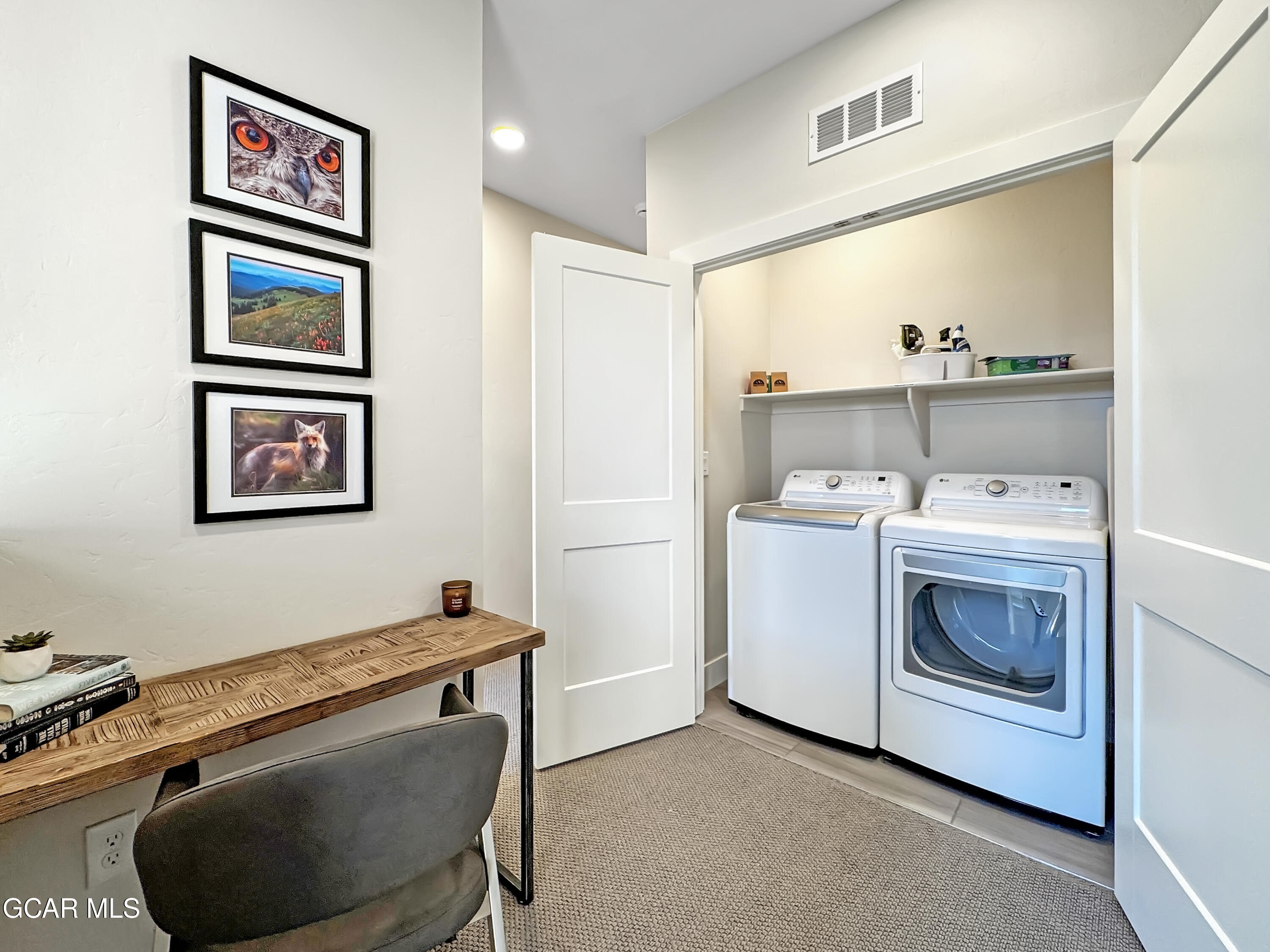166 Homestead Loop Fraser, CO 80442 - Photo 37 of 56 a utility room with closet dryer and washer