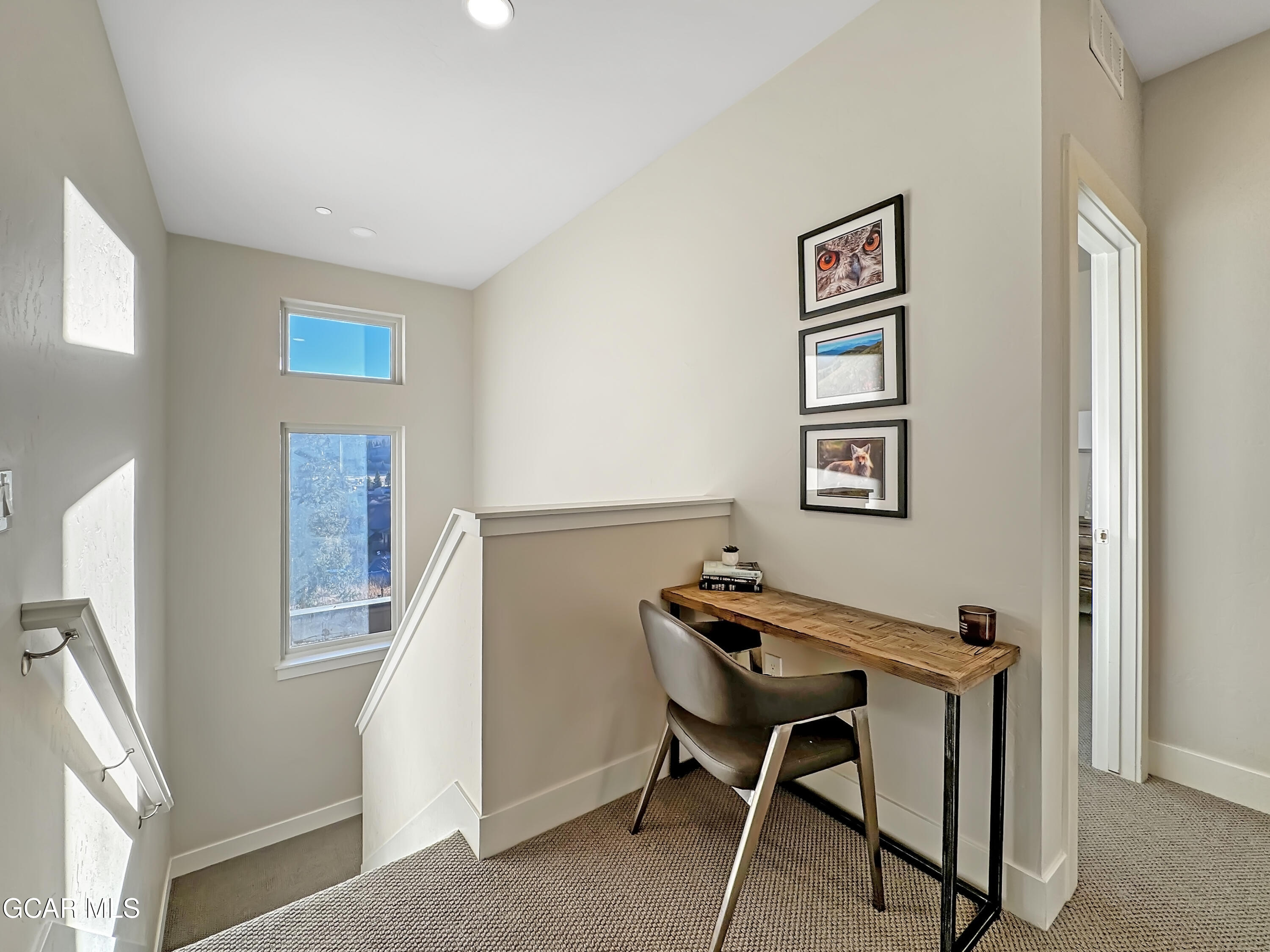 166 Homestead Loop Fraser, CO 80442 - Photo 38 of 56 a view of a workspace with furniture and a window