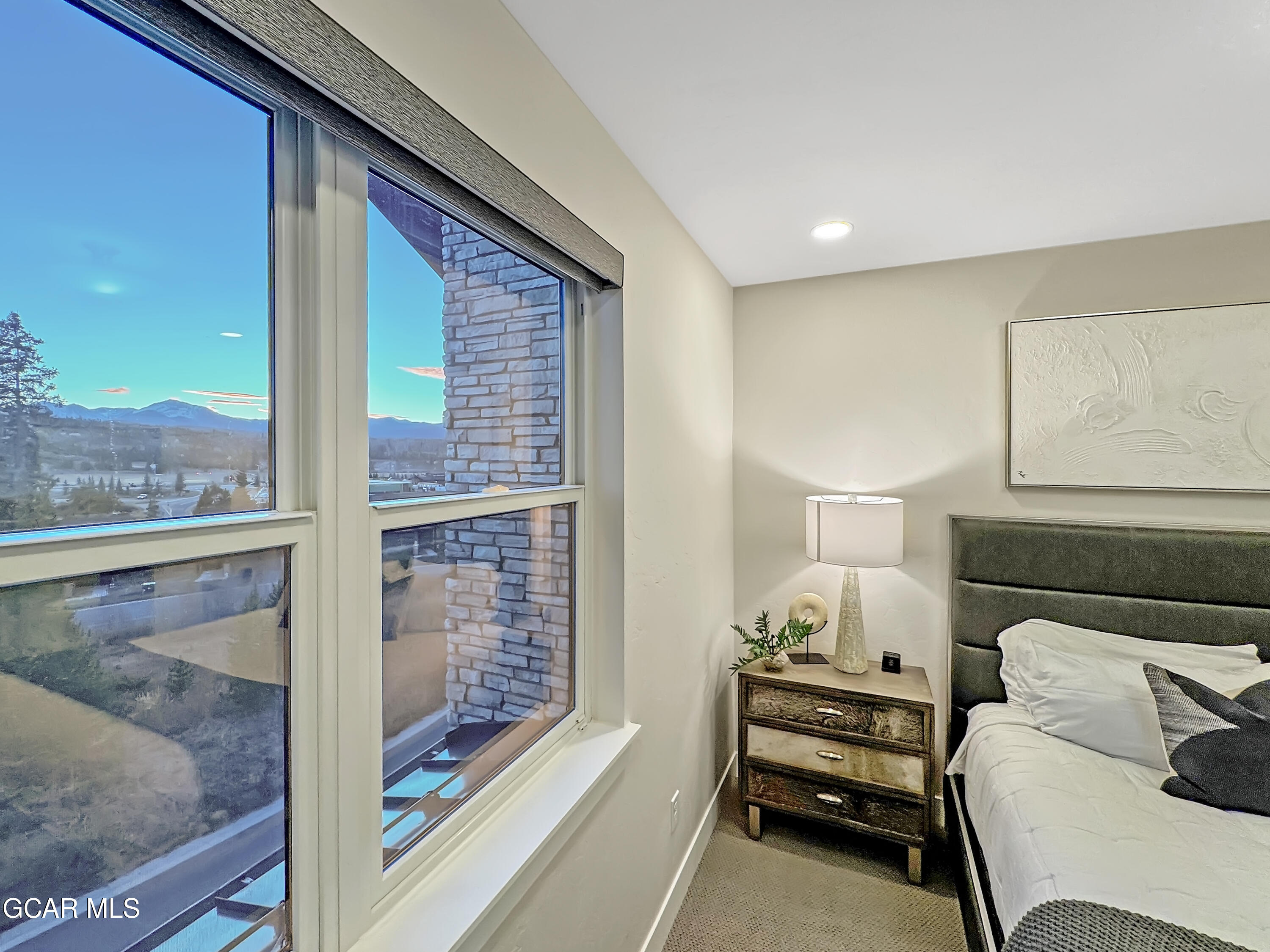 166 Homestead Loop Fraser, CO 80442 - Photo 40 of 56 a bedroom with furniture and a window