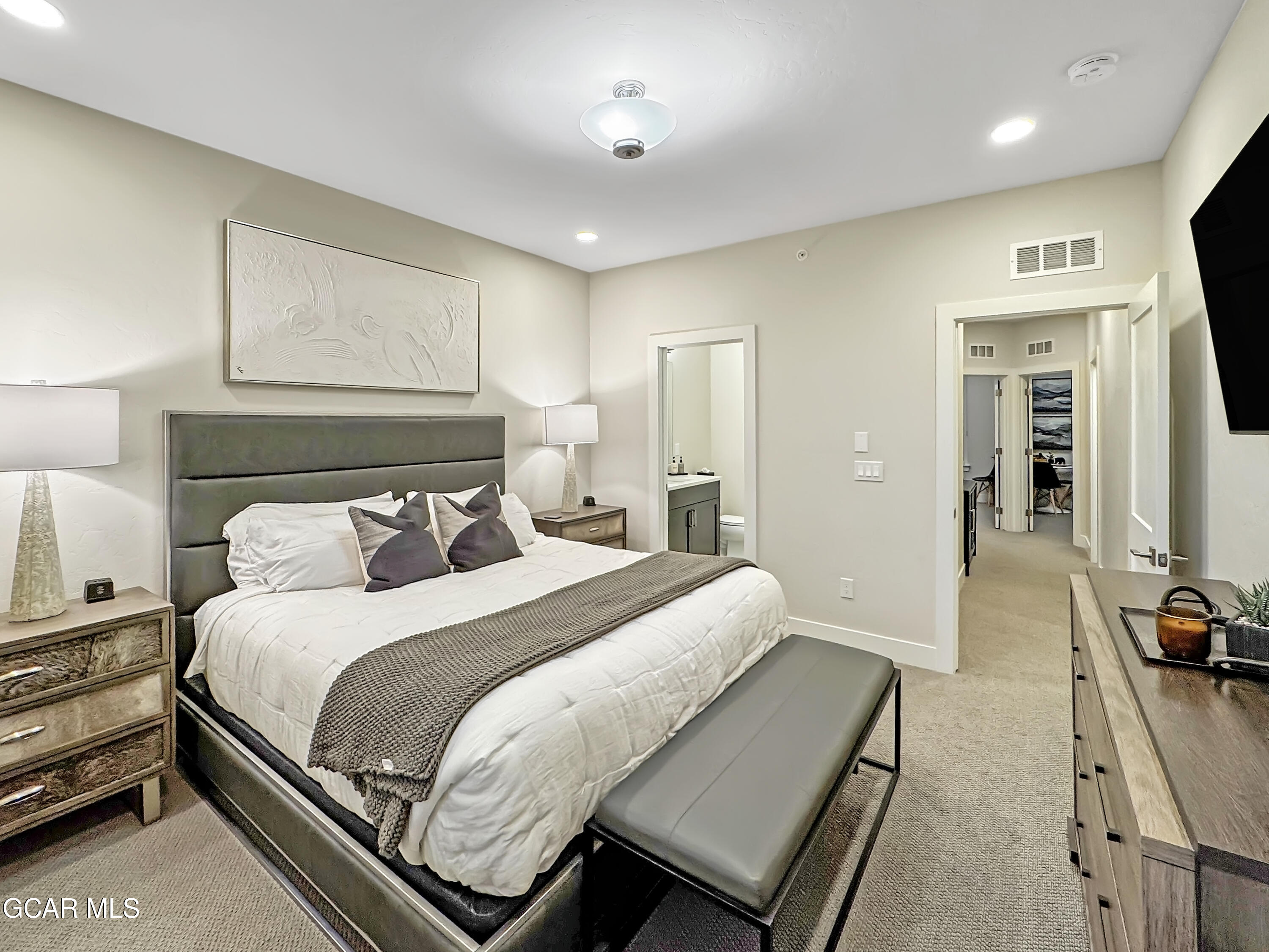 166 Homestead Loop Fraser, CO 80442 - Photo 42 of 56 a bedroom with a bed and a view of bedroom