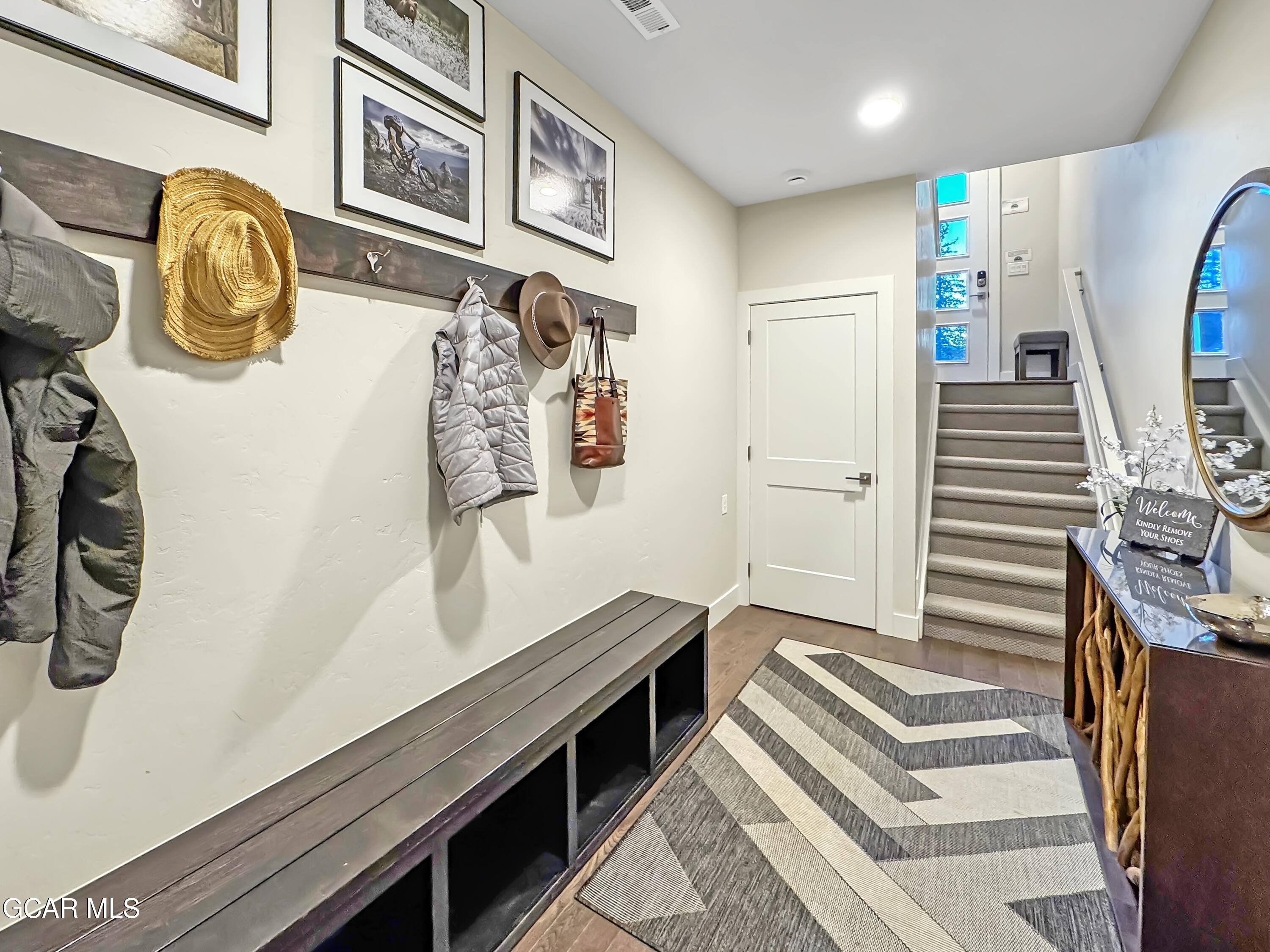 166 Homestead Loop Fraser, CO 80442 - Photo 5 of 56 a view of an entryway with wooden floor