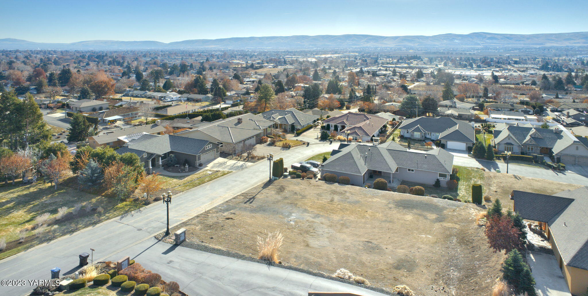 5834 Scenic Ridge Loop Yakima, WA 98908 - Photo 3 of 7 an aerial view of residential houses with outdoor space