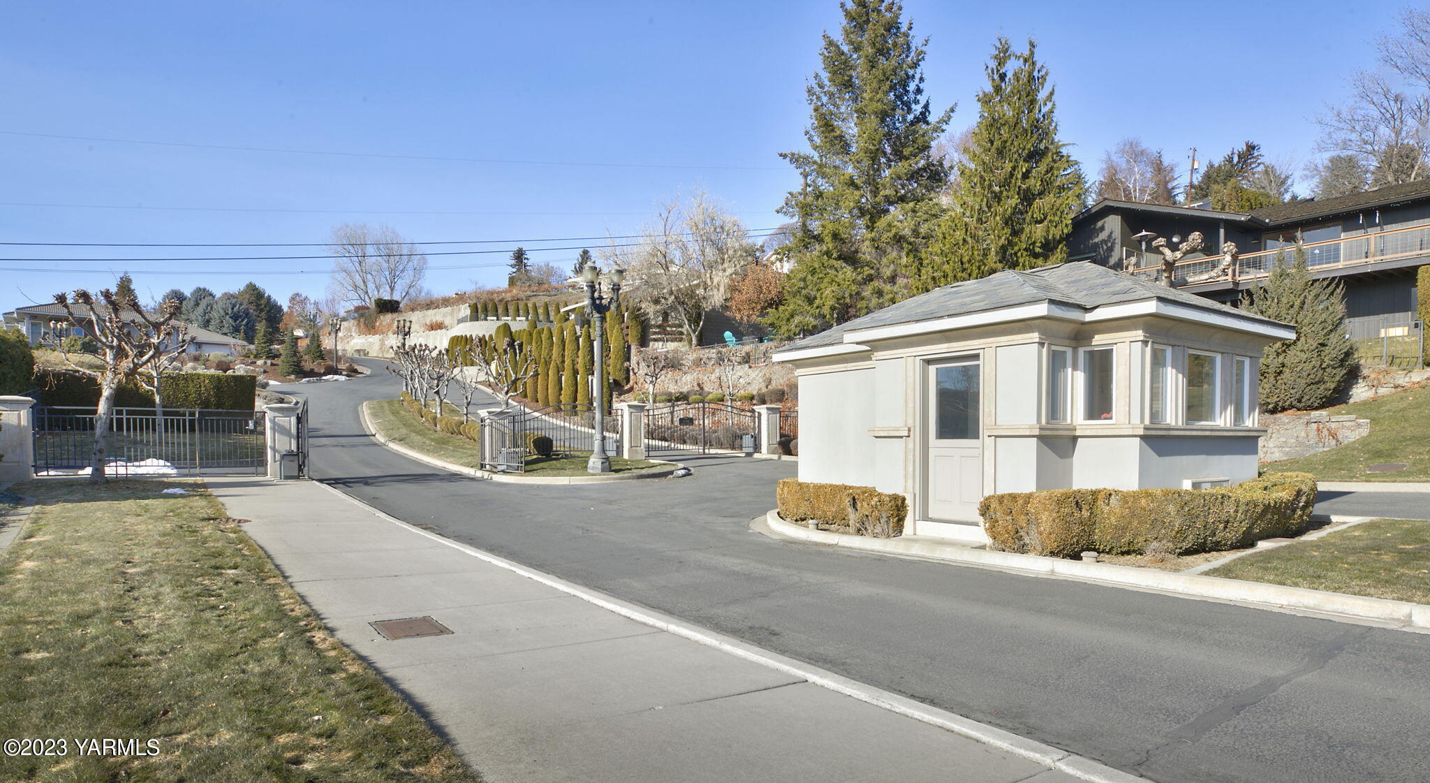 5834 Scenic Ridge Loop Yakima, WA 98908 - Photo 5 of 7 a view of a white apartments with large windows