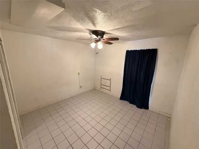 a bathroom with a toilet a sink and bathtub