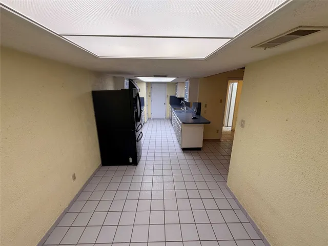 en empty room with windows